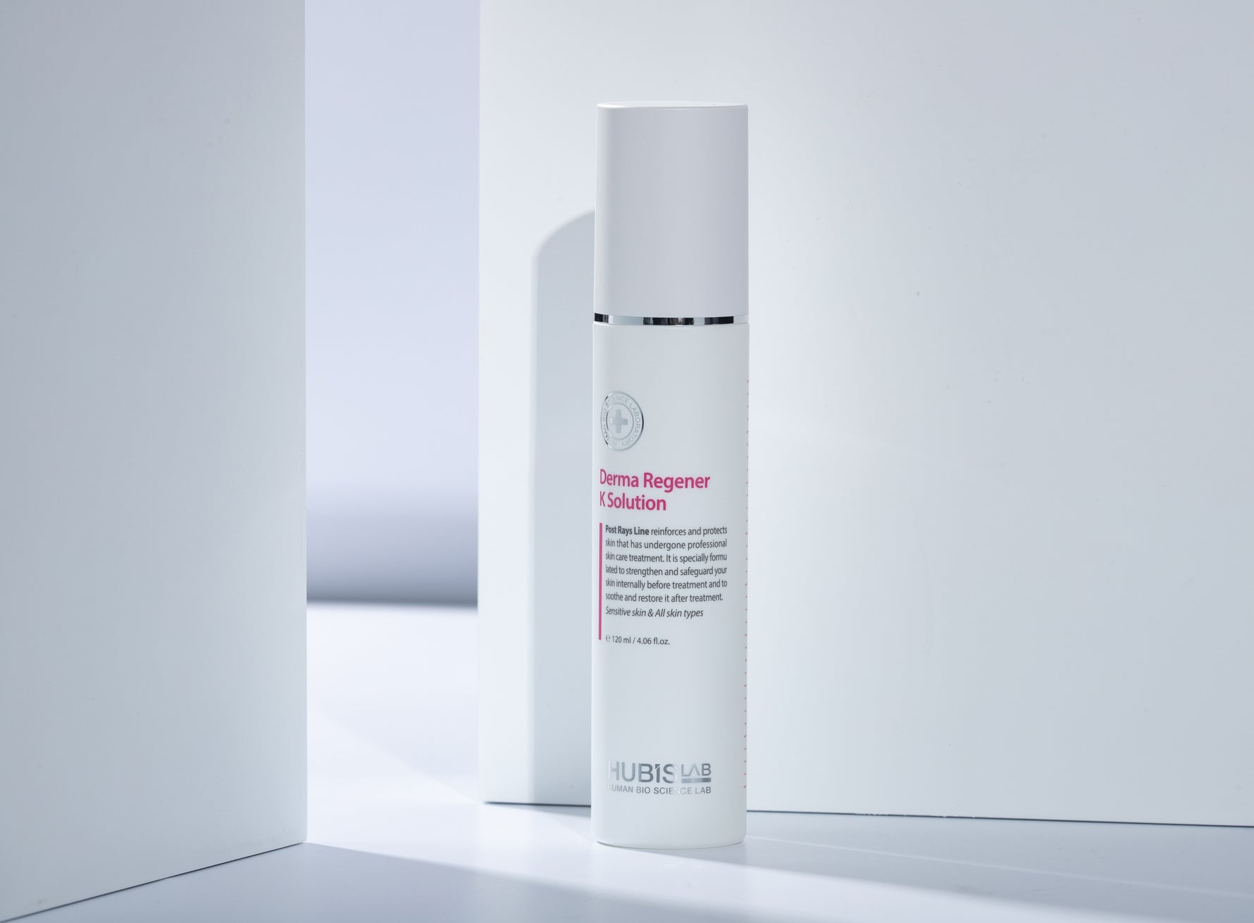 A white bottle of Post Rays Derma Regener K Solution by Hubislab in stylish white setting