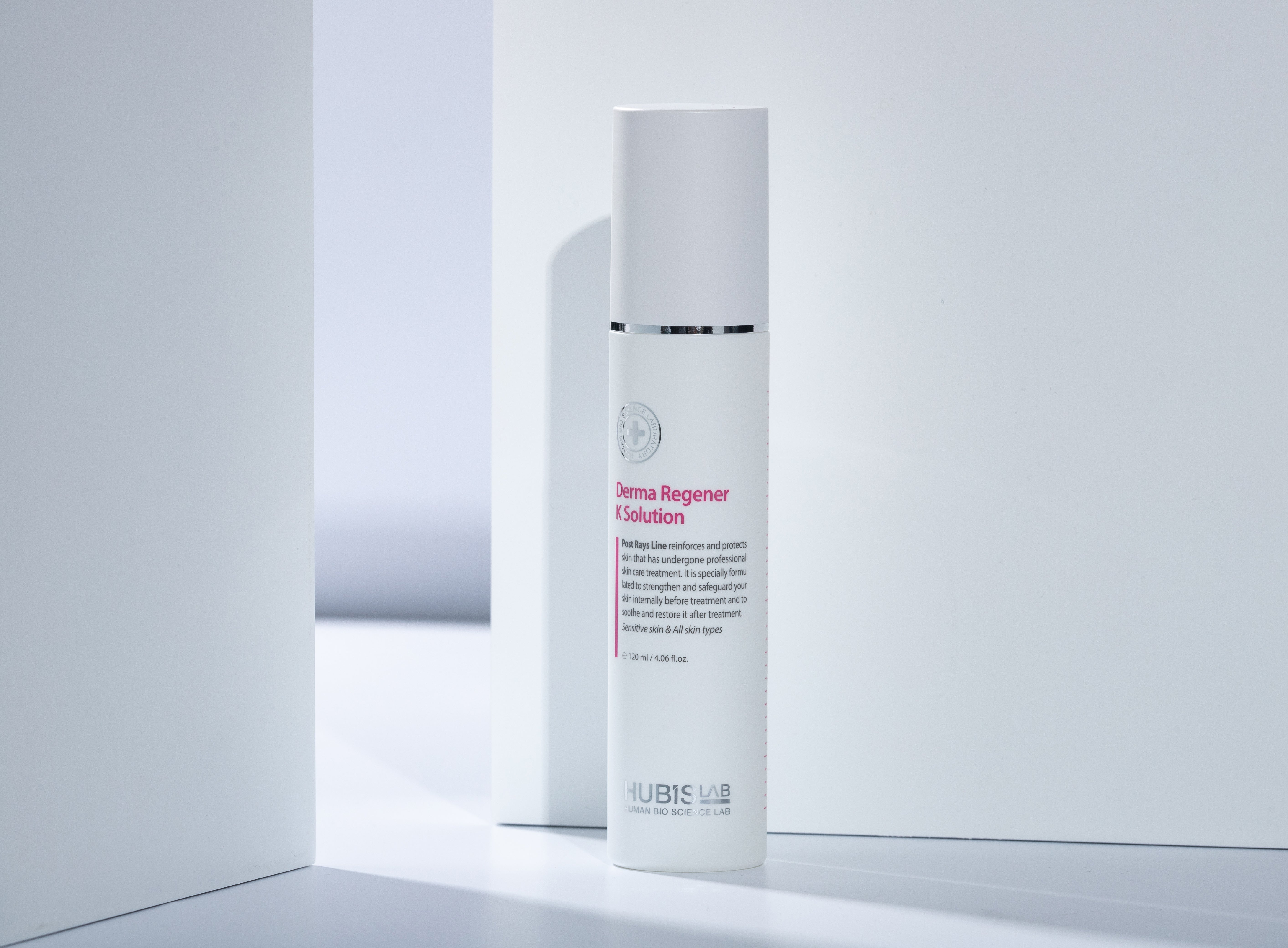 A white bottle of Post Rays Derma Regener K Solution by Hubislab in stylish white setting