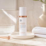 Hubislab Premium Active Revival Essence 50ml displayed on a clean premium bathroom vanity with a soft towel, glass dish and refined copper styling.