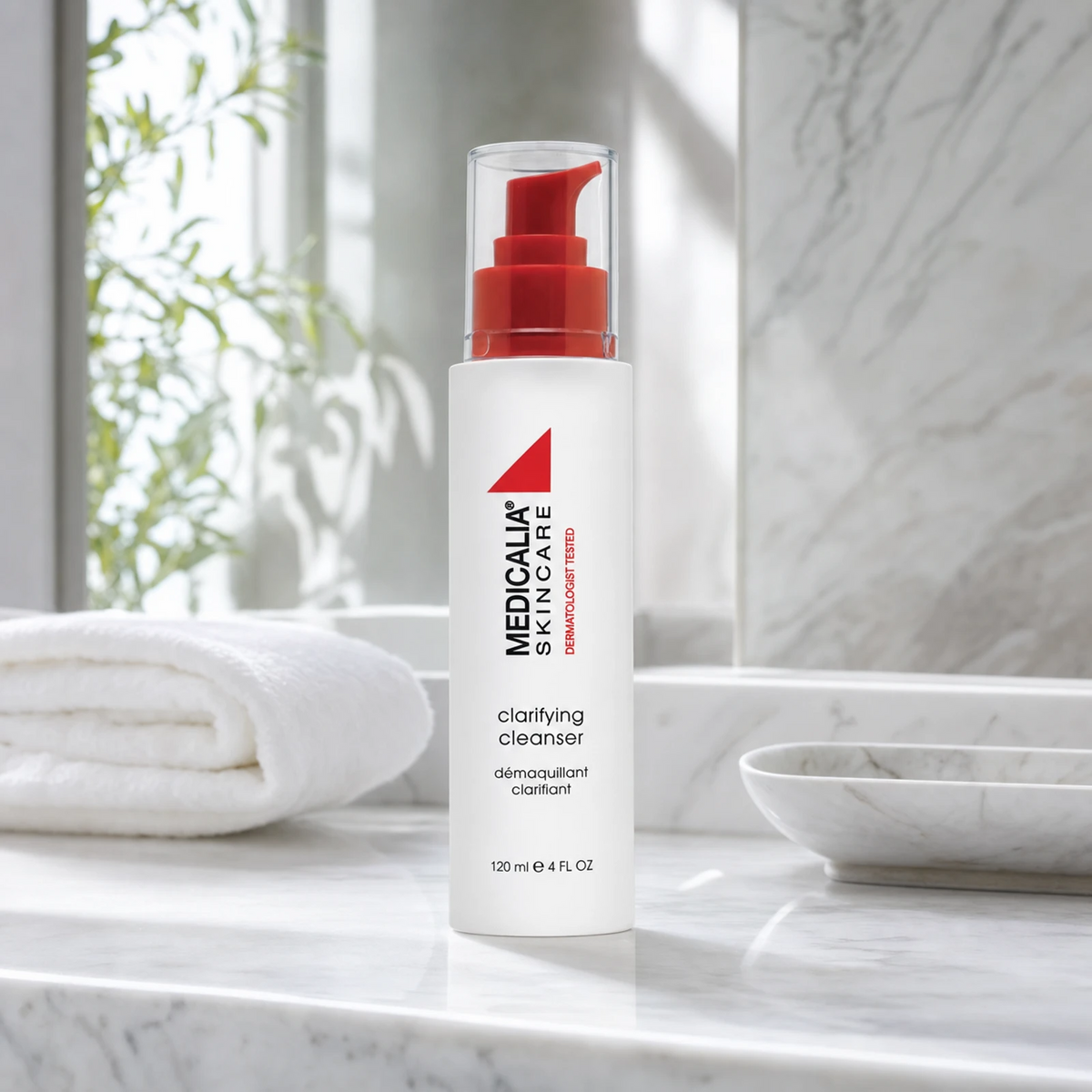 Medicalia Clarifying Cleanser 120ml on a premium marble bathroom vanity, a deep-cleansing gel with lactic and salicylic acids for acne-prone, oily, and congested skin.