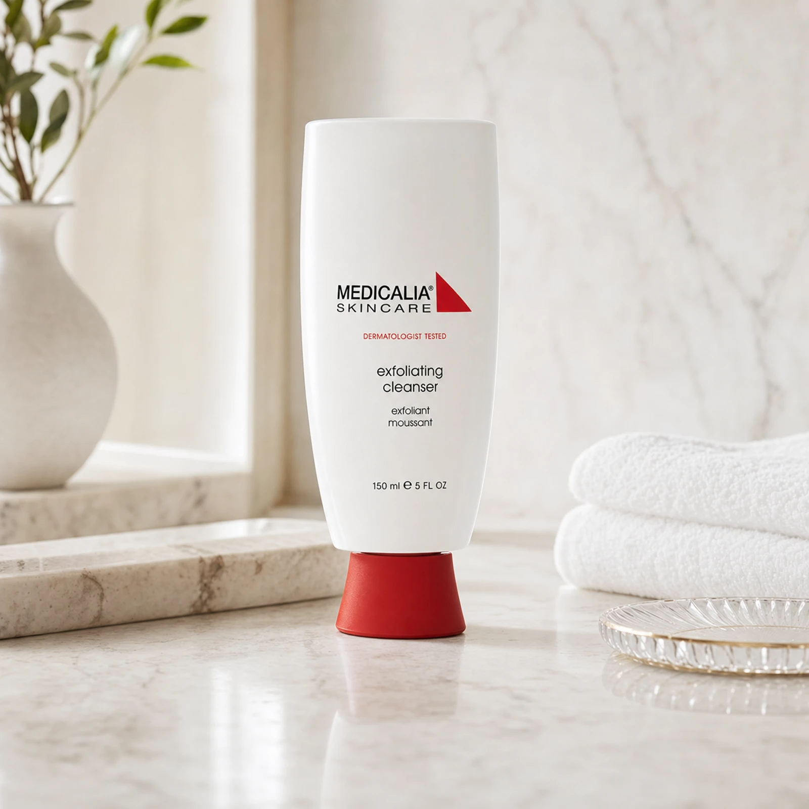 Medicalia Exfoliating Cleanser 150ml on a premium bathroom vanity, a gentle daily exfoliating face wash for smooth, clear skin.