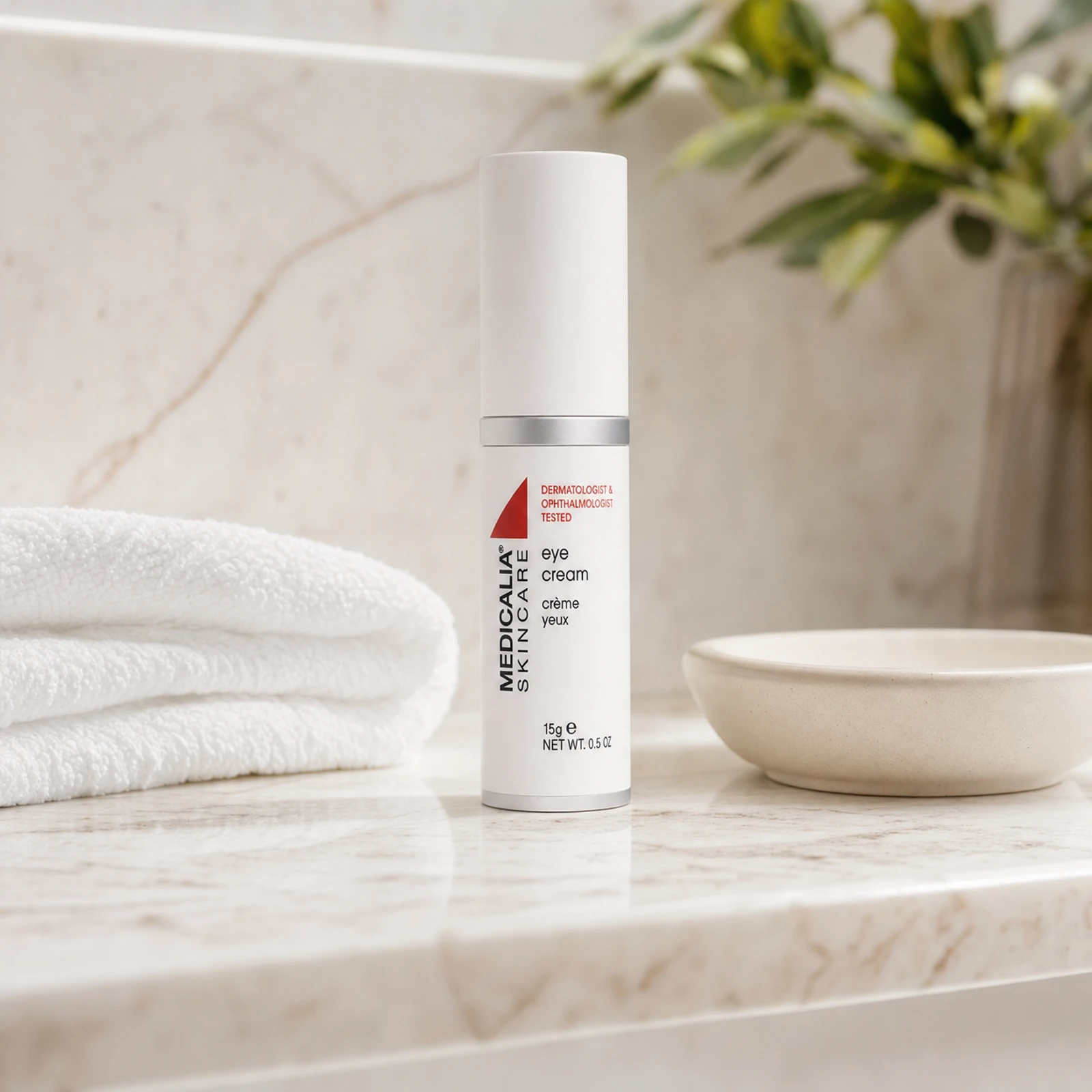Medicalia Eye Cream 15g on a premium marble bathroom vanity, a nourishing firming eye cream for fine lines, dryness, and delicate under-eye skin.