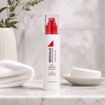 Medicalia Eye Make-Up Remover 120ml on a premium marble bathroom vanity with cotton pads, a gentle hydrating eye makeup remover for all skin types including sensitive and post-procedure.