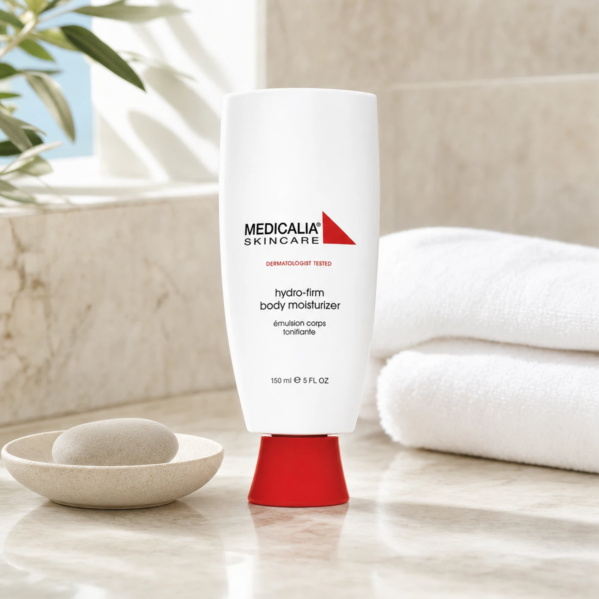Medicalia Hydro-Firm Body Moisturiser 150ml on a premium marble bathroom vanity, a fast-absorbing peptide-enriched body moisturiser for deep hydration, firmness, and softer skin.