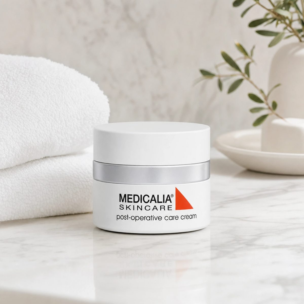 Medicalia Post-Operative Care Cream 50ml on a premium bathroom vanity, an advanced healing cream for post-procedure skin recovery and scar minimisation.