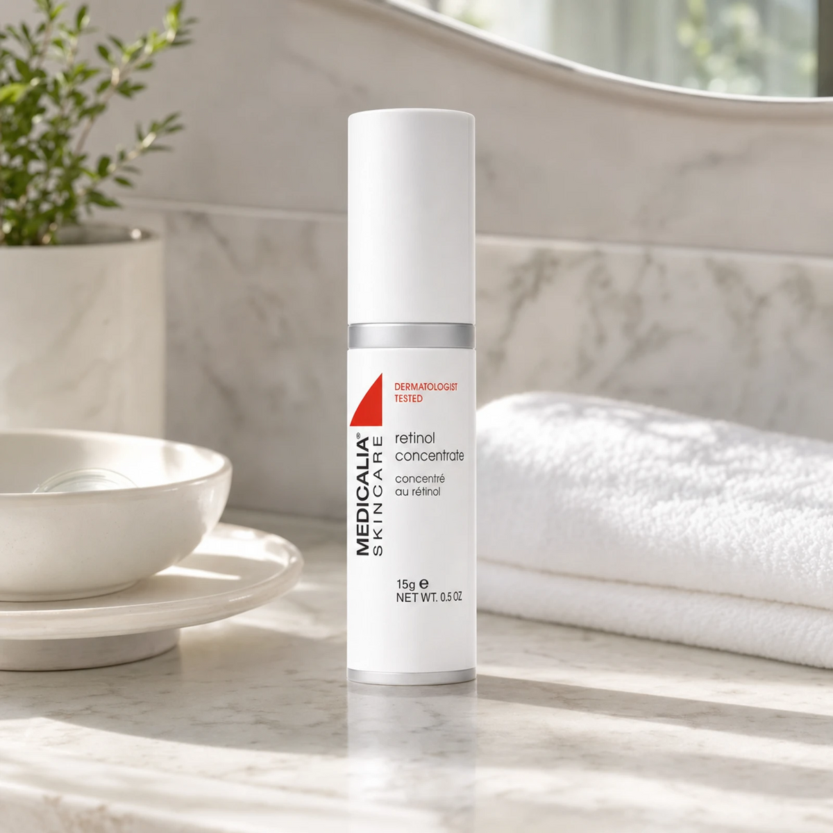 Medicalia Retinol Concentrate 15g on a premium marble bathroom vanity, a powerful Micro-Retinol night concentrate for smoothing fine lines, improving skin density, and brightening uneven tone.