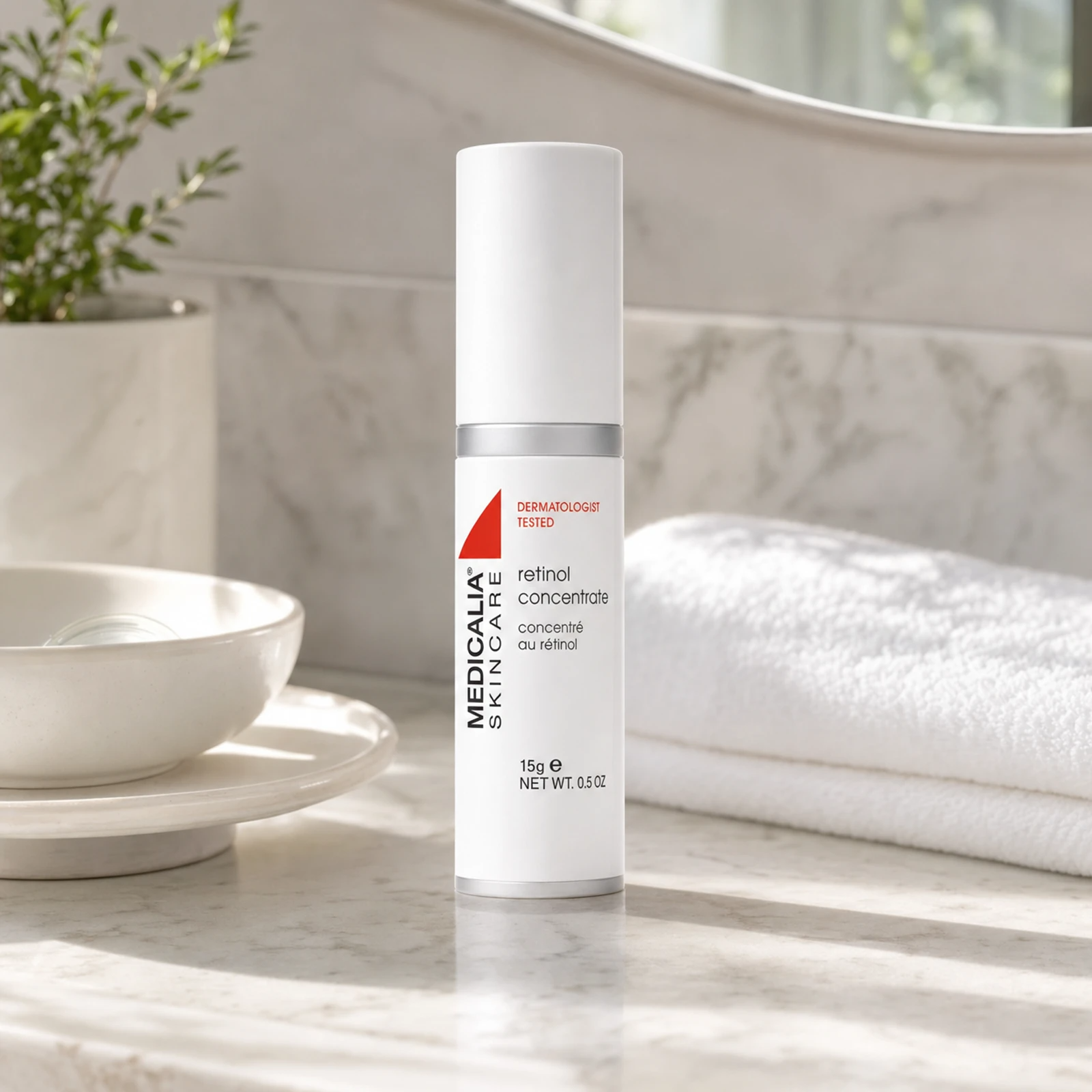Medicalia Retinol Concentrate 15g on a premium marble bathroom vanity, a powerful Micro-Retinol night concentrate for smoothing fine lines, improving skin density, and brightening uneven tone.