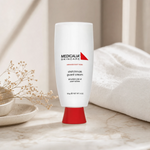 Medicalia Stretchmark Guard Cream 150ml on a premium marble vanity surface, a clinically tested prenatal and post-delivery cream with shea butter and elastin to prevent and improve stretch marks.