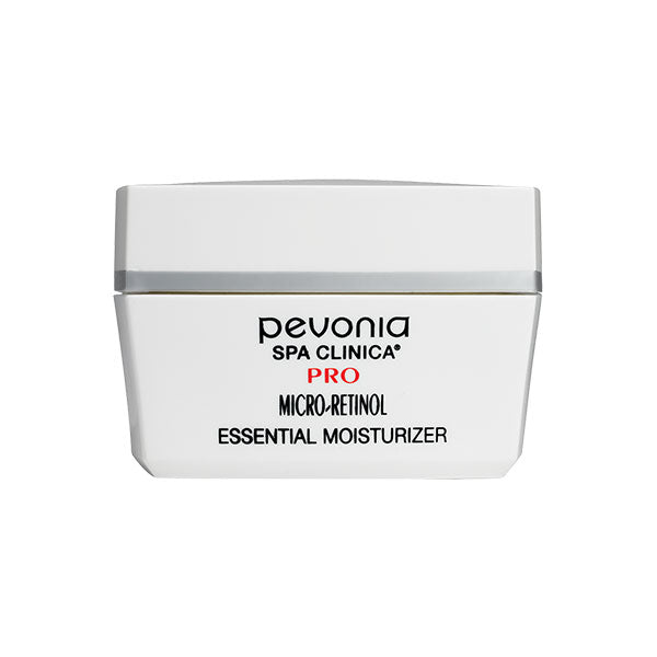 A white jar of Pevonia Micro-Retinol Essential Moisturizer with a silver band and product information on the label.