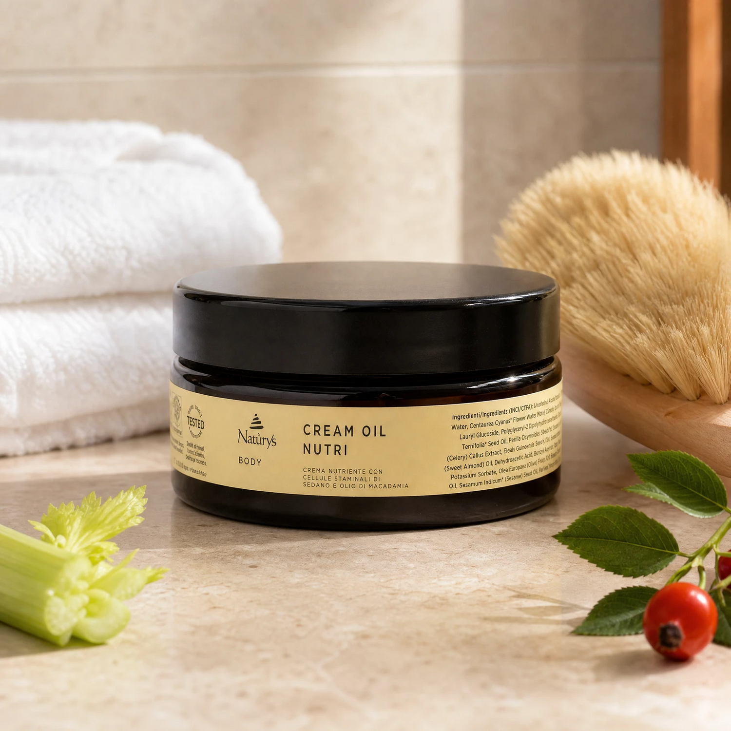 Naturys Body Cream Oil Nutri 250ml premium amber glass jar styled on a marble vanity with white towels and a dry body brush for Beauty Collective consumer retail.