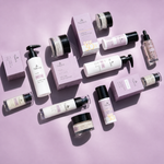 Naturys Face Anti-Age skincare range flat lay featuring SPF 50 serum cleanser cream and treatment products on lavender background for mature and dehydrated skin