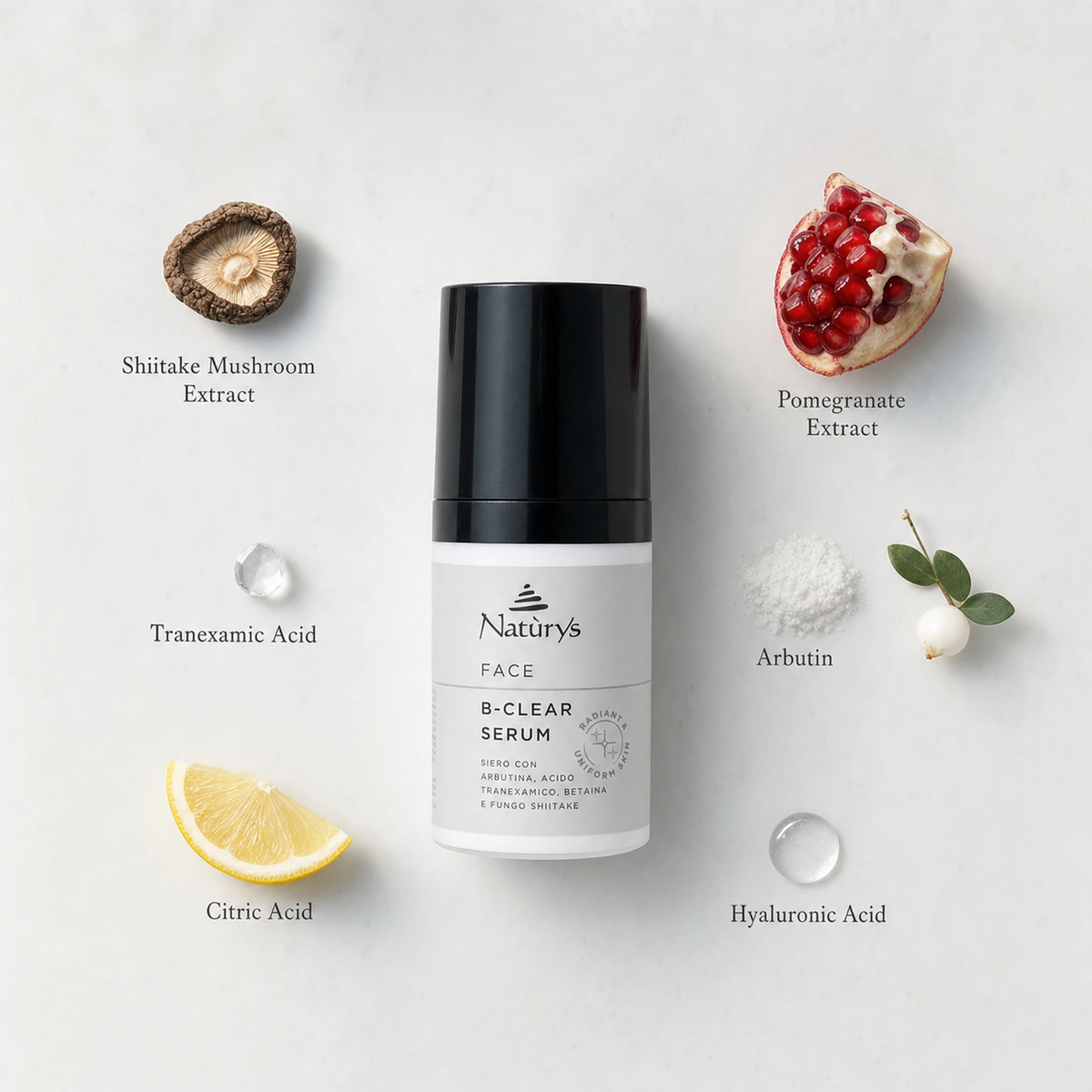 Naturys Face B-Clear Serum 30ml ingredient flatlay on clean pale grey surface with labelled ingredients: Shiitake Mushroom Extract, Pomegranate Extract, Tranexamic Acid, Arbutin, Citric Acid, and Hyaluronic Acid
