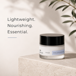 Jar of moisturizing cream with text 'Lightweight. Nourishing. Essential.' on a neutral background