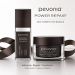 Pevonia Power Repair Age Correction Bundle featuring an intensifier collagen serum and a marine collagen cream jar, both in dark brown and clear packaging with a dark brown ribbon, on a light gray background.