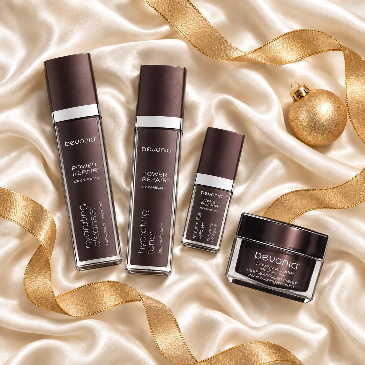 PEVONIA AGE CORRECTION COLLAGEN GIFT BOX arranged in a festive flatlay. File: pevonia-age-correction-collagen-gift-box-christmas-flatlay-2026.jpg