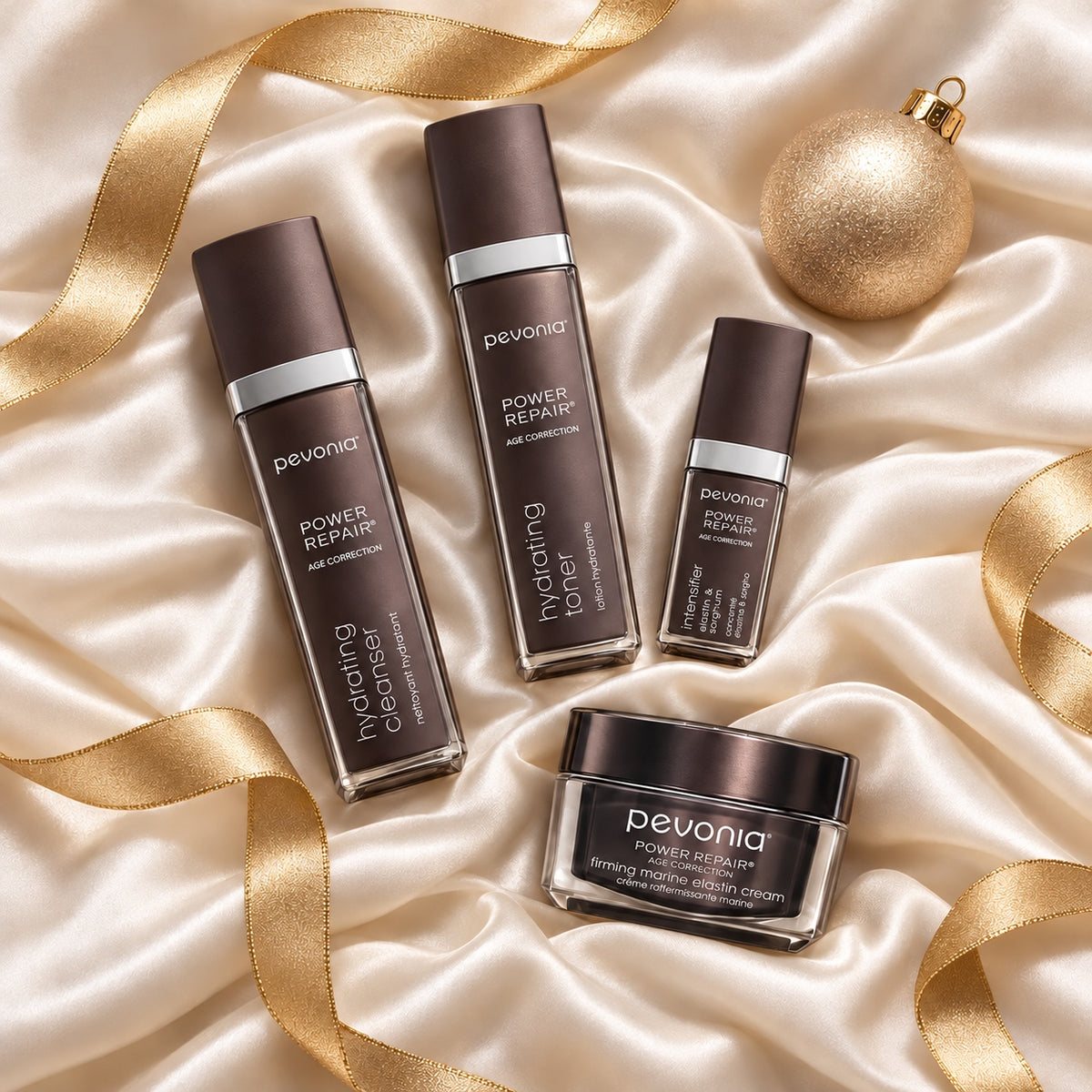 PEVONIA AGE CORRECTION ELASTIN GIFT BOX arranged in a festive flatlay. File: pevonia-age-correction-elastin-gift-box-christmas-flatlay-2026.jpg