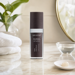 Pevonia Age Correction Eye Contour 30ml on a luxury bathroom vanity for puffiness, dark circles and fine lines