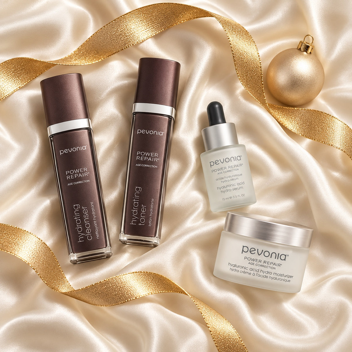 PEVONIA AGE CORRECTION HYALURONIC GIFT BOX arranged in a festive flatlay. File: pevonia-age-correction-hyaluronic-gift-box-christmas-flatlay-2026.jpg