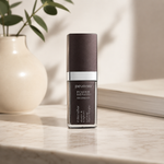 Pevonia Age Correction Intensifier Elastin and Sorghum 30ml on a luxury bathroom vanity for firming, elasticity and mature skin