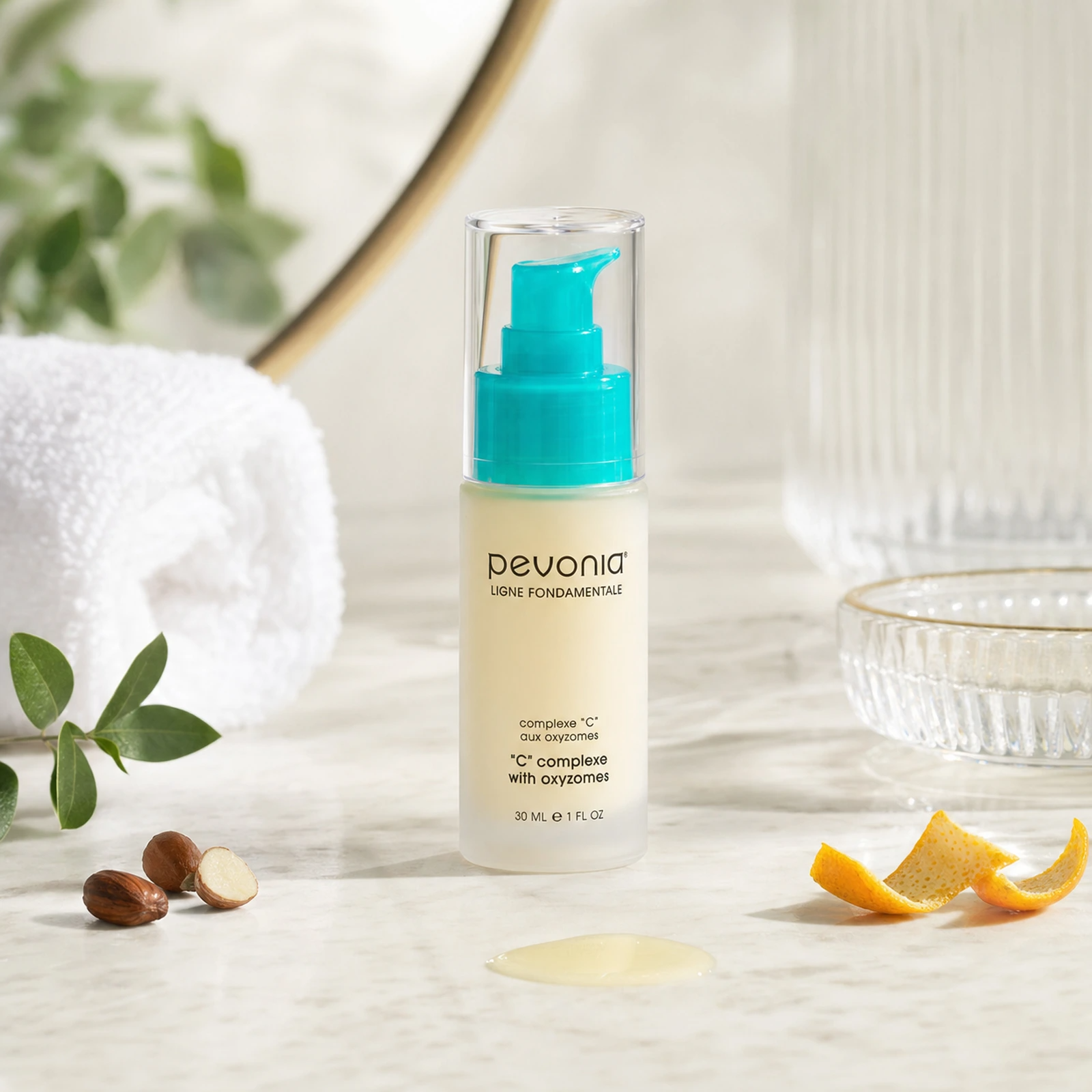 Pevonia C Complexe with Oxyzomes 30ml on a luxury bathroom vanity for dull, uneven and sun-damaged skin