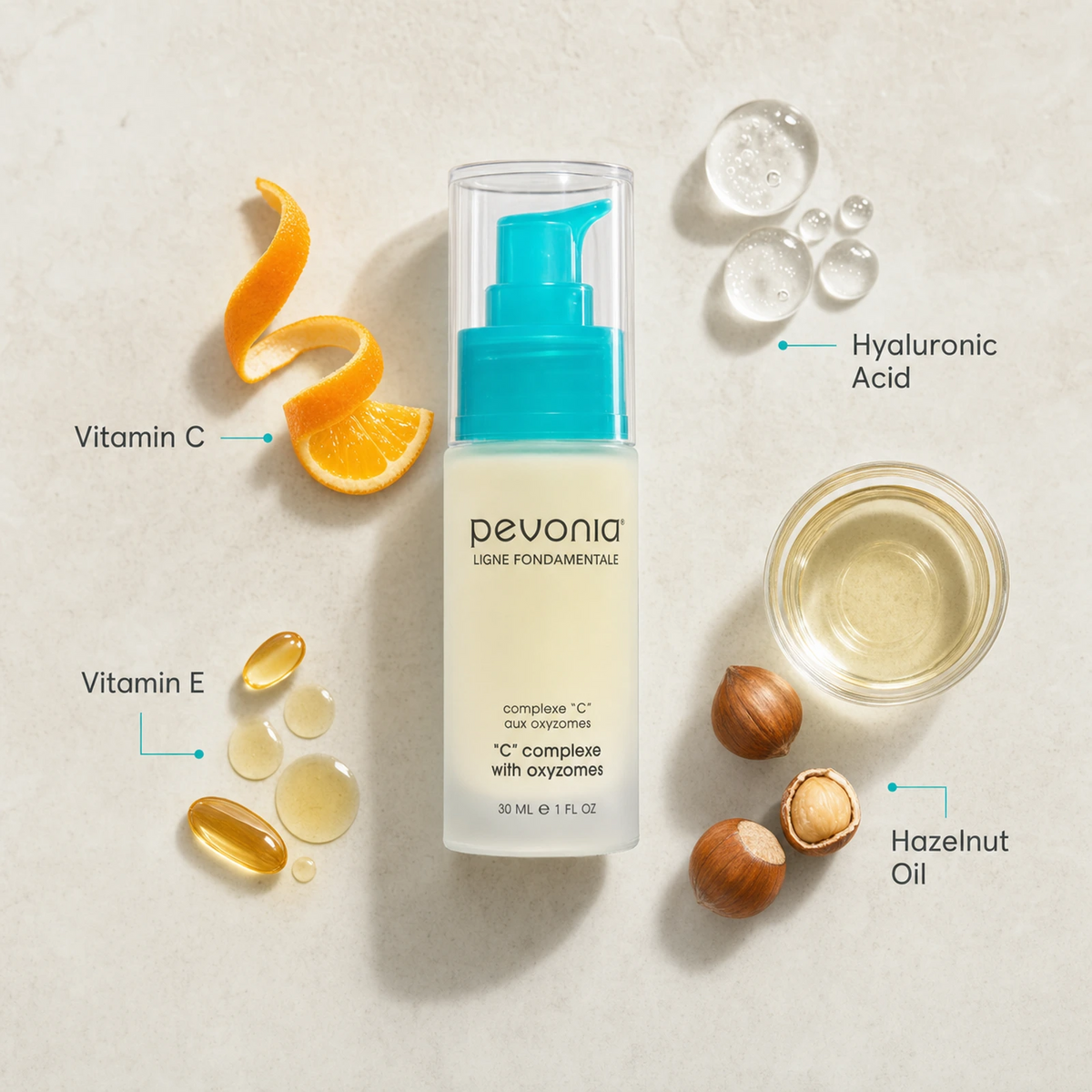 Pevonia C Complexe with Oxyzomes 30ml ingredient flatlay with Vitamin C, Hyaluronic Acid, Vitamin E and Hazelnut Oil