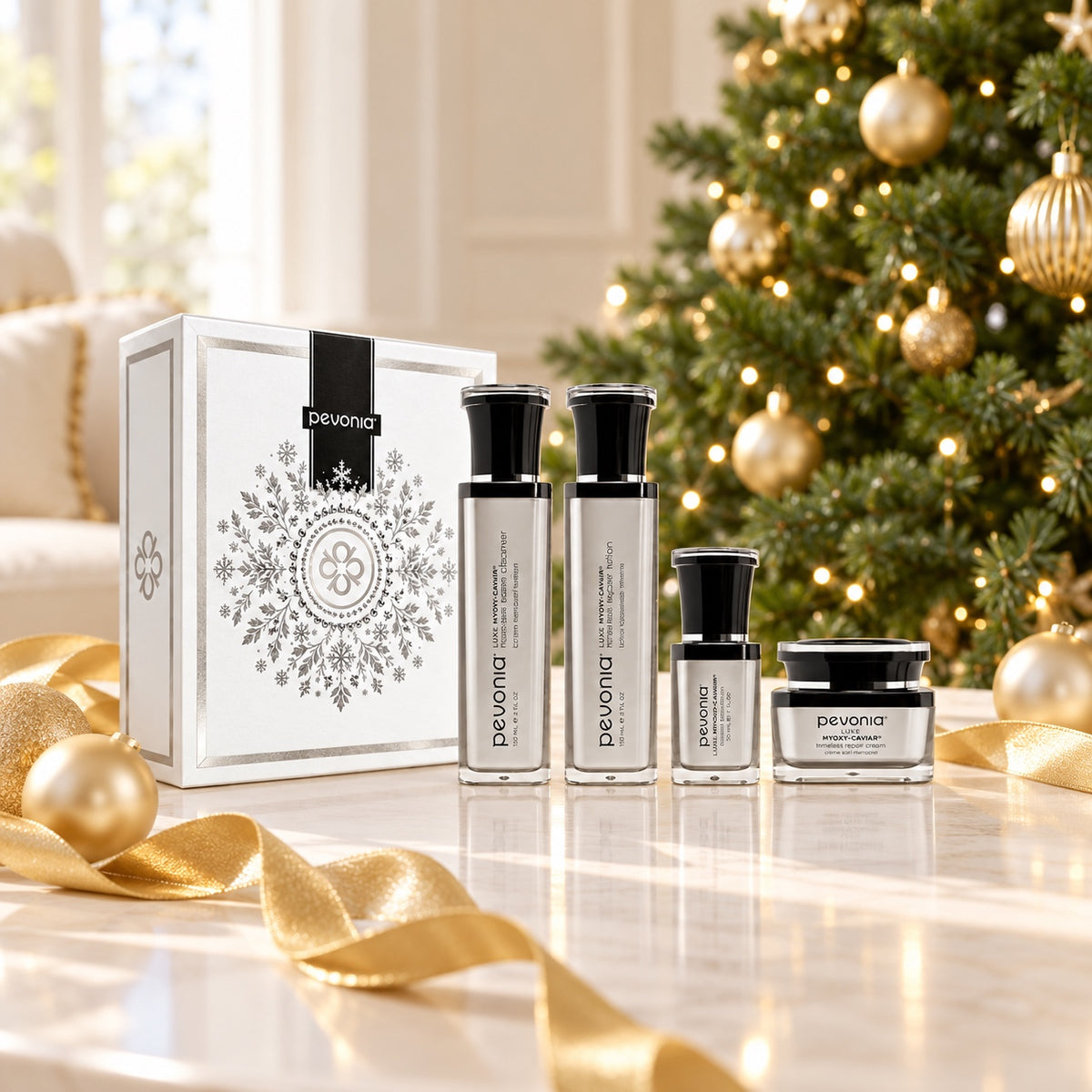 PEVONIA CAVIAR LUXURY DE-AGEING GIFT BOX displayed beside a Christmas tree. File: pevonia-caviar-luxury-de-ageing-gift-box-christmas-tree-2026.jpg