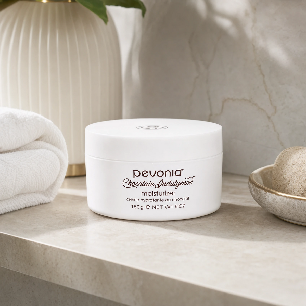 Pevonia Chocolate Indulgence Moisturizer 150ml on a luxury bathroom vanity for deeply nourished, softer and more radiant face and body skin