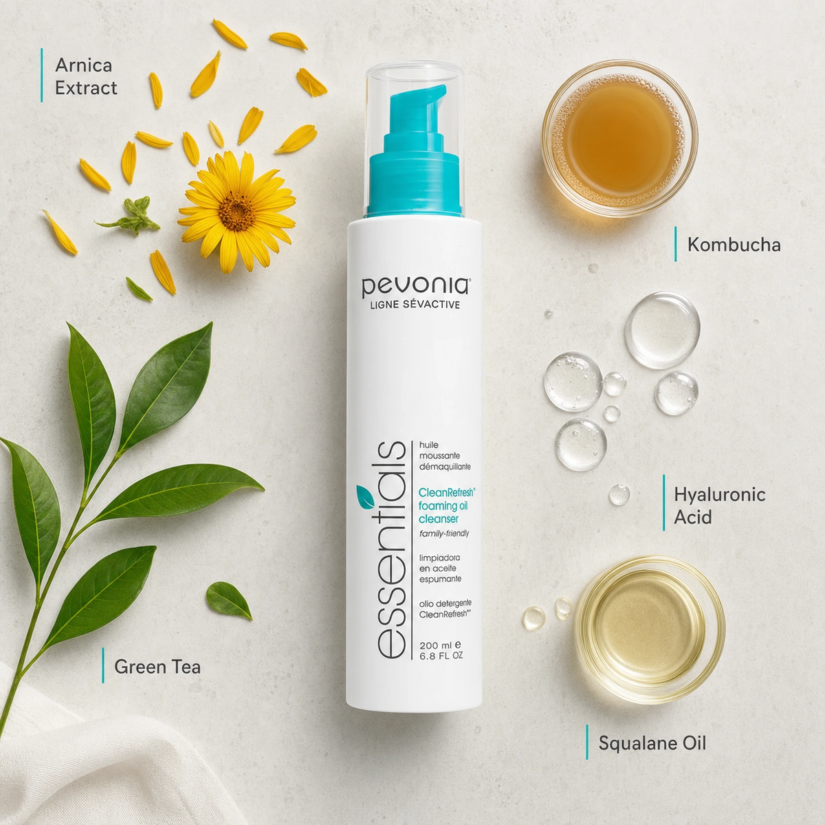 Pevonia CleanRefresh Foaming Oil Cleanser 200ml ingredient flatlay with Arnica Extract, Green Tea, Kombucha, Hyaluronic Acid and Squalane Oil