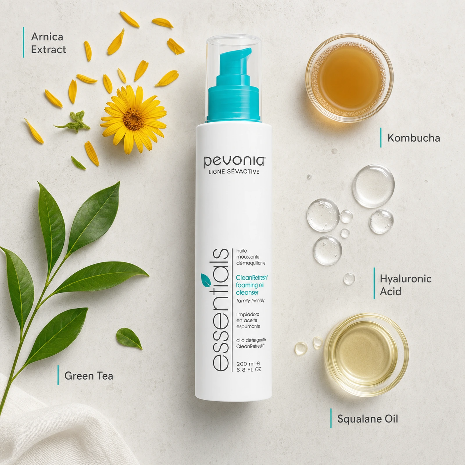 Pevonia CleanRefresh Foaming Oil Cleanser 200ml ingredient flatlay with Arnica Extract, Green Tea, Kombucha, Hyaluronic Acid and Squalane Oil