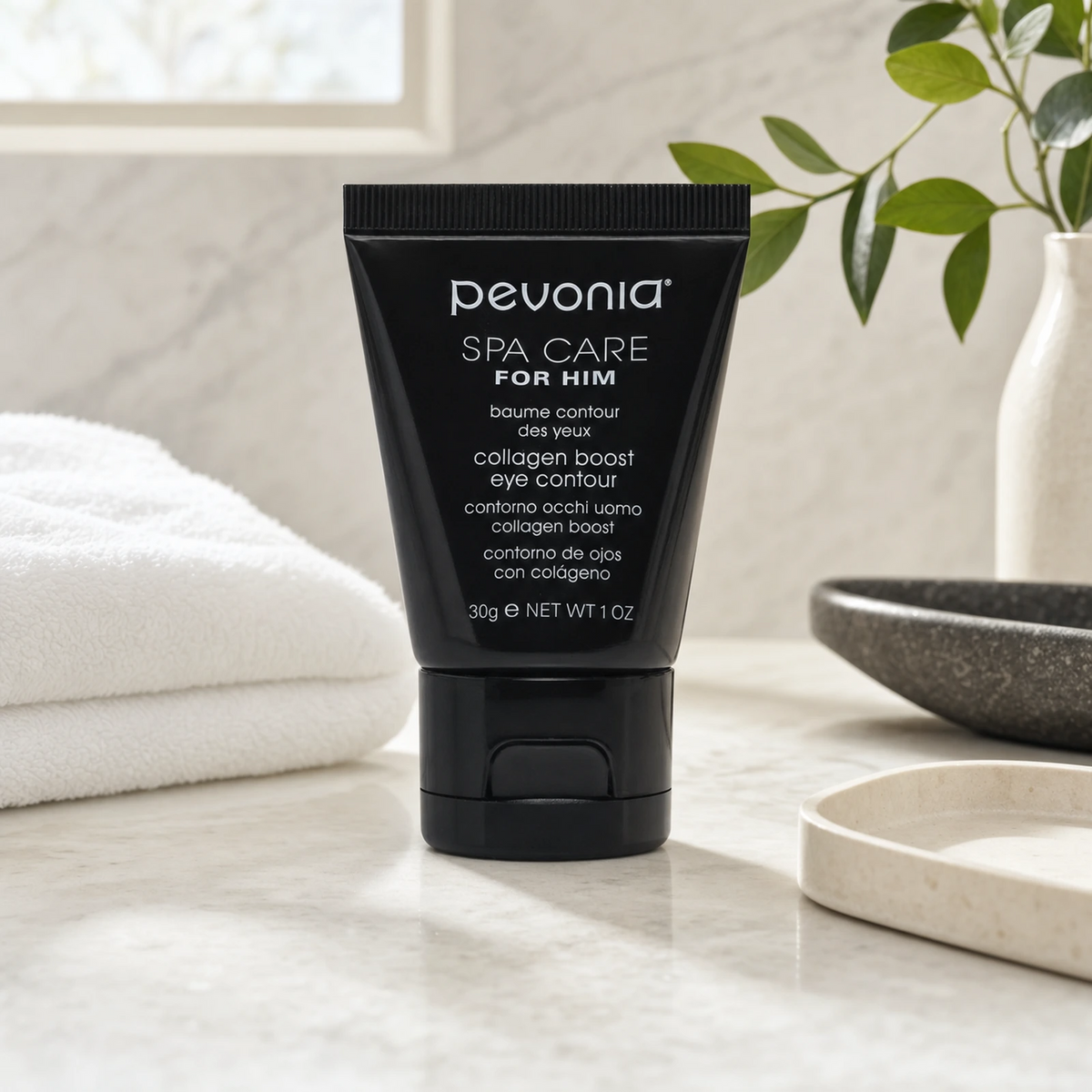 Pevonia Collagen Boost Eye Contour 30ml on a luxury bathroom vanity for men's fine lines, dryness and tired-looking eyes