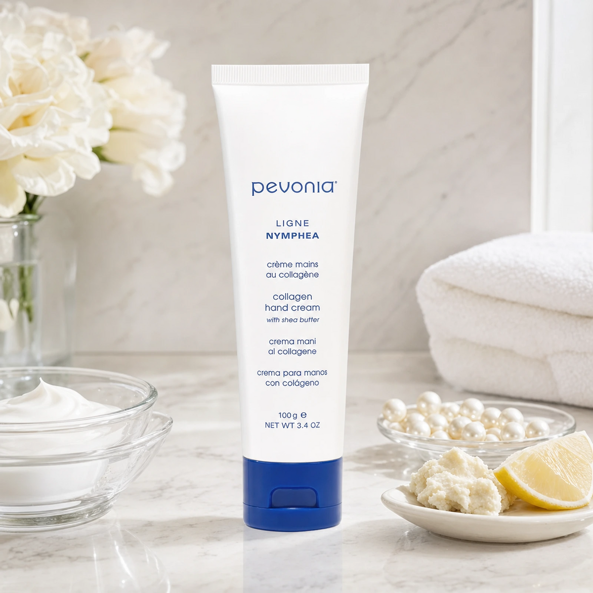 Pevonia Collagen Hand Cream 100ml on a luxury bathroom vanity for dry, rough and ageing hands