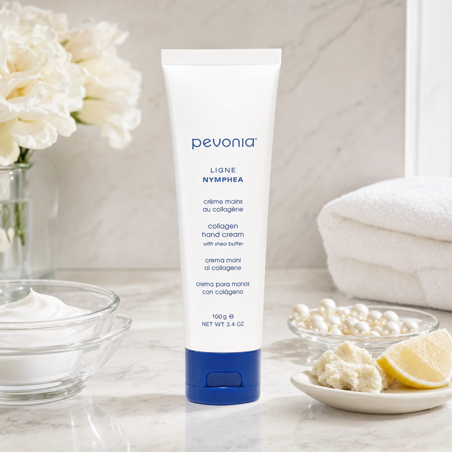 Pevonia Collagen Hand Cream 100ml on a luxury bathroom vanity for dry, rough and ageing hands