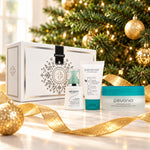 PEVONIA Combination Skin Gift Box displayed beside a Christmas tree. File: pevonia-combination-skin-gift-box-christmas-tree-2026.jpg