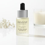 Pevonia De-Stress Escape Aromatic Oil 15ml on a luxury bathroom vanity for dry, tired and sensitive skin