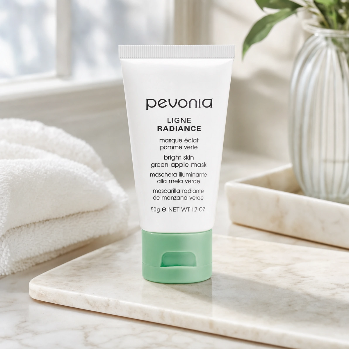 Pevonia Green Apple Mask 50ml on a luxury bathroom vanity for brighter, hydrated and refined-looking skin