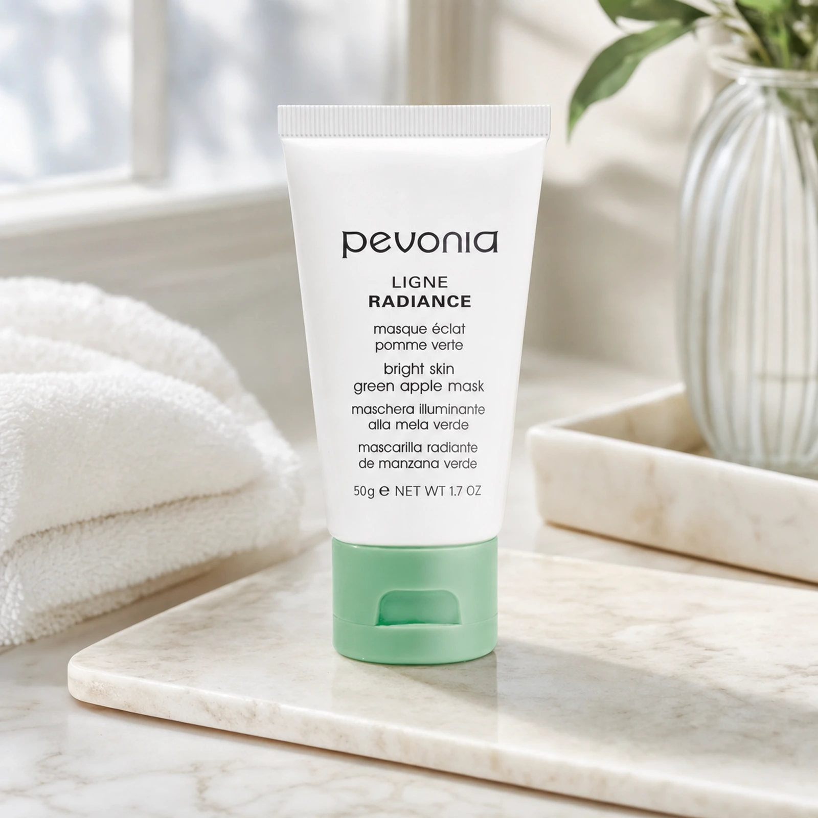 Pevonia Green Apple Mask 50ml on a luxury bathroom vanity for brighter, hydrated and refined-looking skin