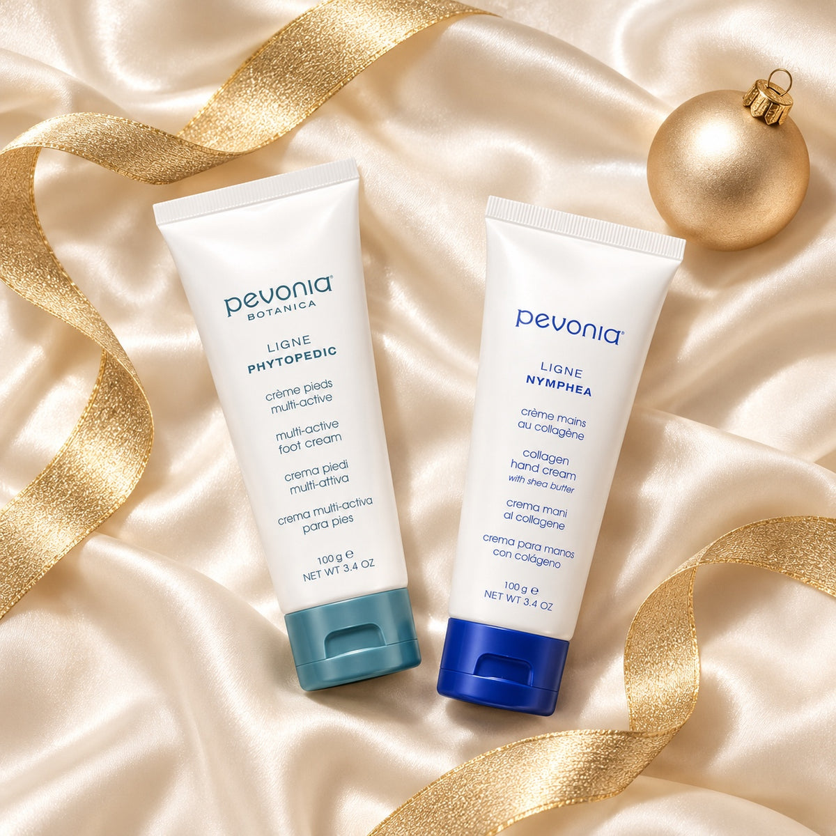 Pevonia Hand & Foot Gift Pack arranged in a festive flatlay. File: pevonia-hand-and-foot-gift-pack-christmas-flatlay-2026.jpg