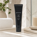 Pevonia Lumafirm Body Moisturizer 100ml on a luxury bathroom vanity for firmer, smoother and brighter body skin