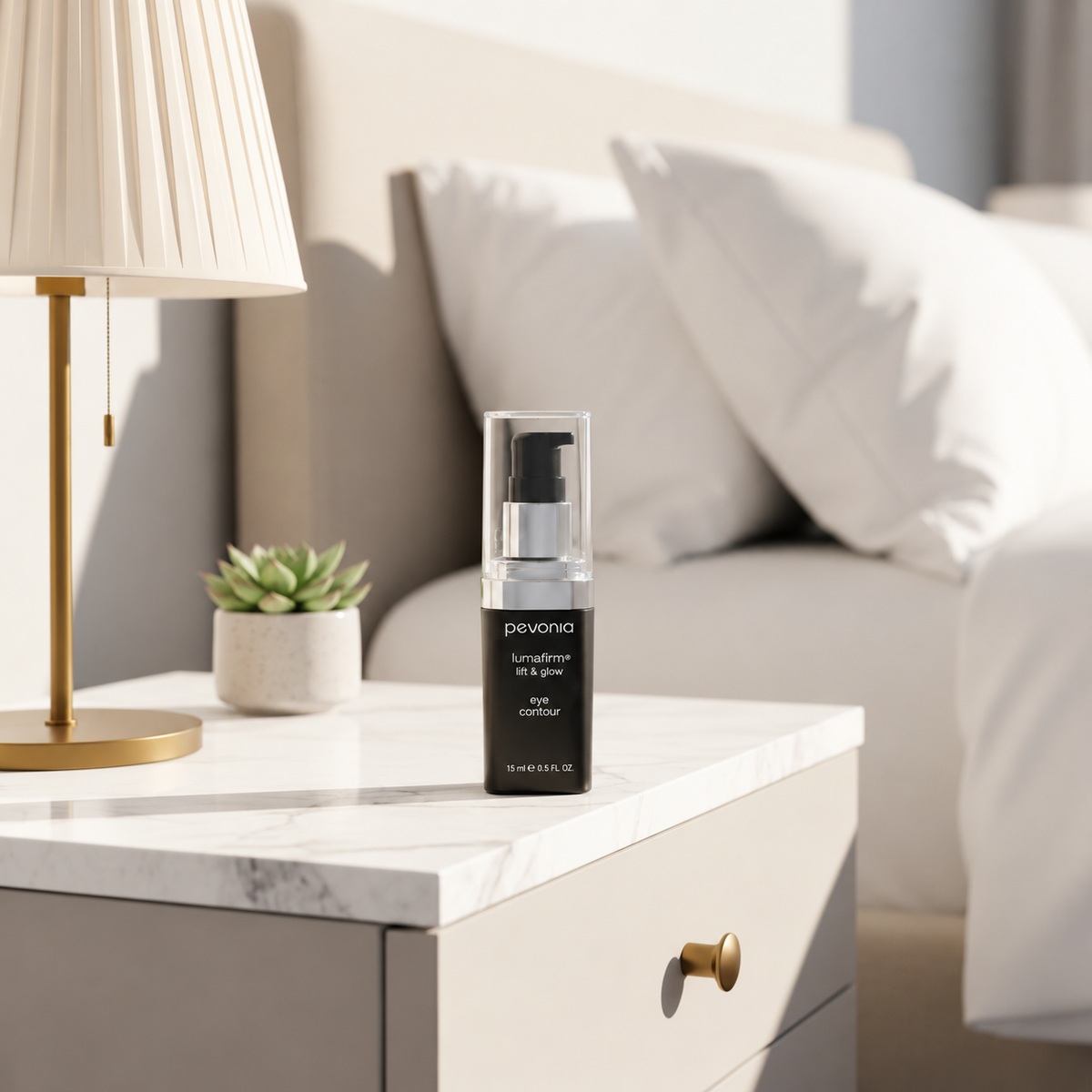 Pevonia Lumafirm Eye Contour Lift and Glow 15ml on a bedside table in a bright bedroom setting.