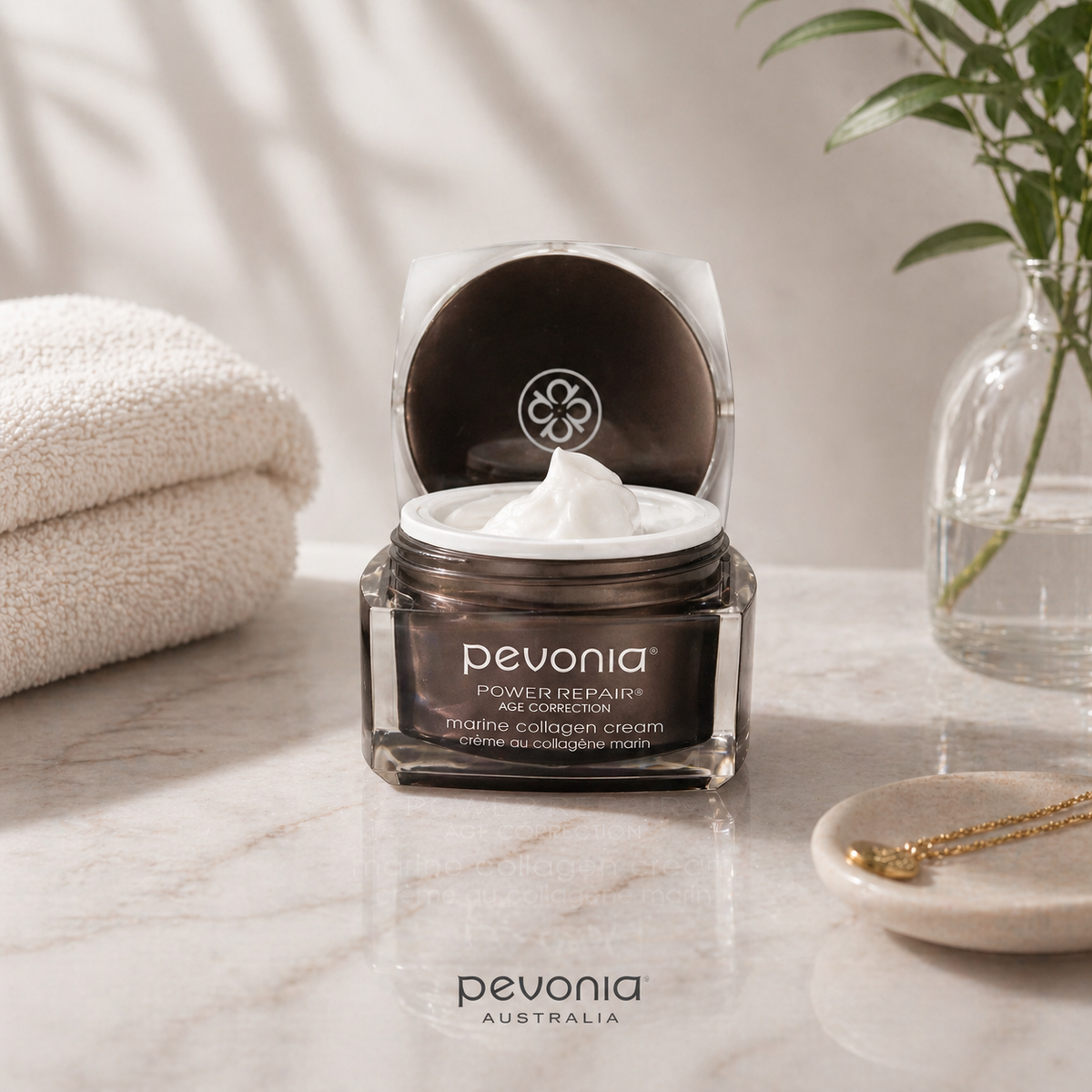 Pevonia Marine Collagen Cream open jar texture lifestyle image with towel and greenery luxury anti ageing moisturiser Australia