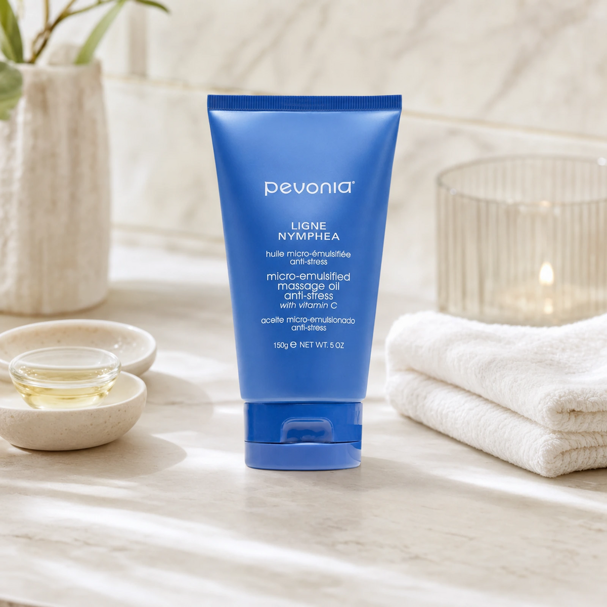 Pevonia Micro-Emulsified Massage Oil Anti-Stress 150g on a luxury bathroom vanity for relaxation, massage glide and nourished skin