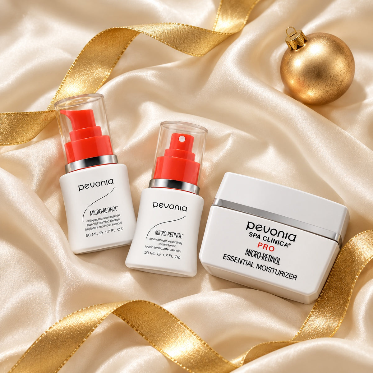 PEVONIA Micro Retinol Essential Gift Box arranged in a festive flatlay. File: pevonia-micro-retinol-essential-gift-box-christmas-flatlay-2026.jpg