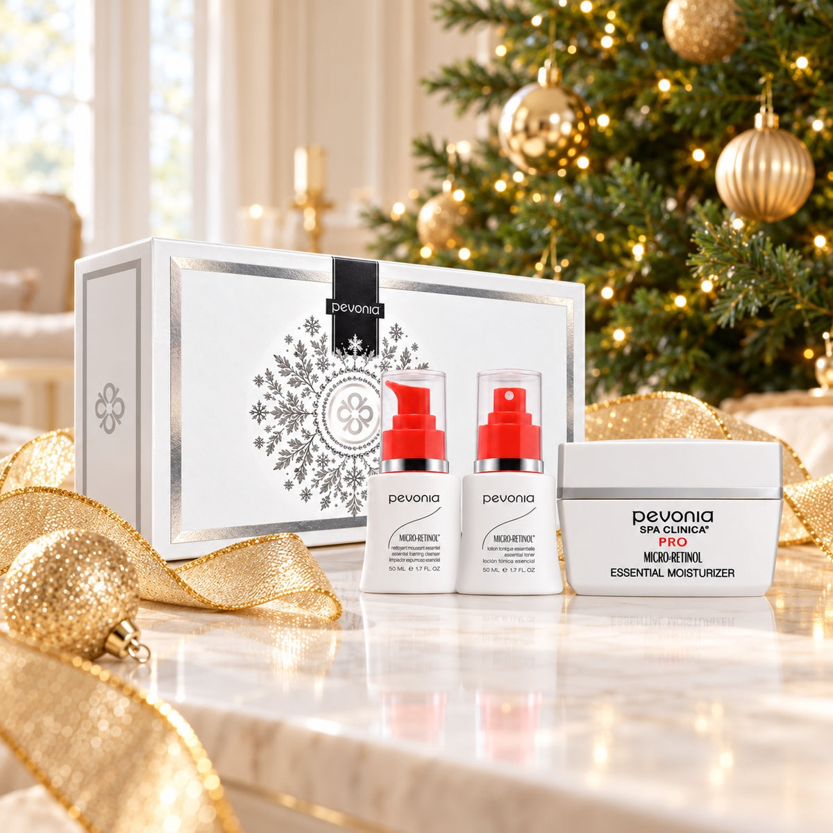 PEVONIA Micro Retinol Essential Gift Box displayed beside a Christmas tree. File: pevonia-micro-retinol-essential-gift-box-christmas-tree-2026.jpg