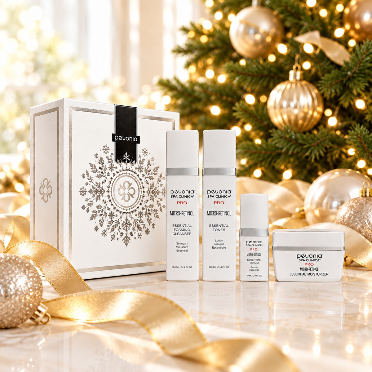 PEVONIA MICRO RETINOL SKIN REFINING GIFT BOX displayed beside a Christmas tree. File: pevonia-micro-retinol-skin-refining-gift-box-christmas-tree-2026.jpg