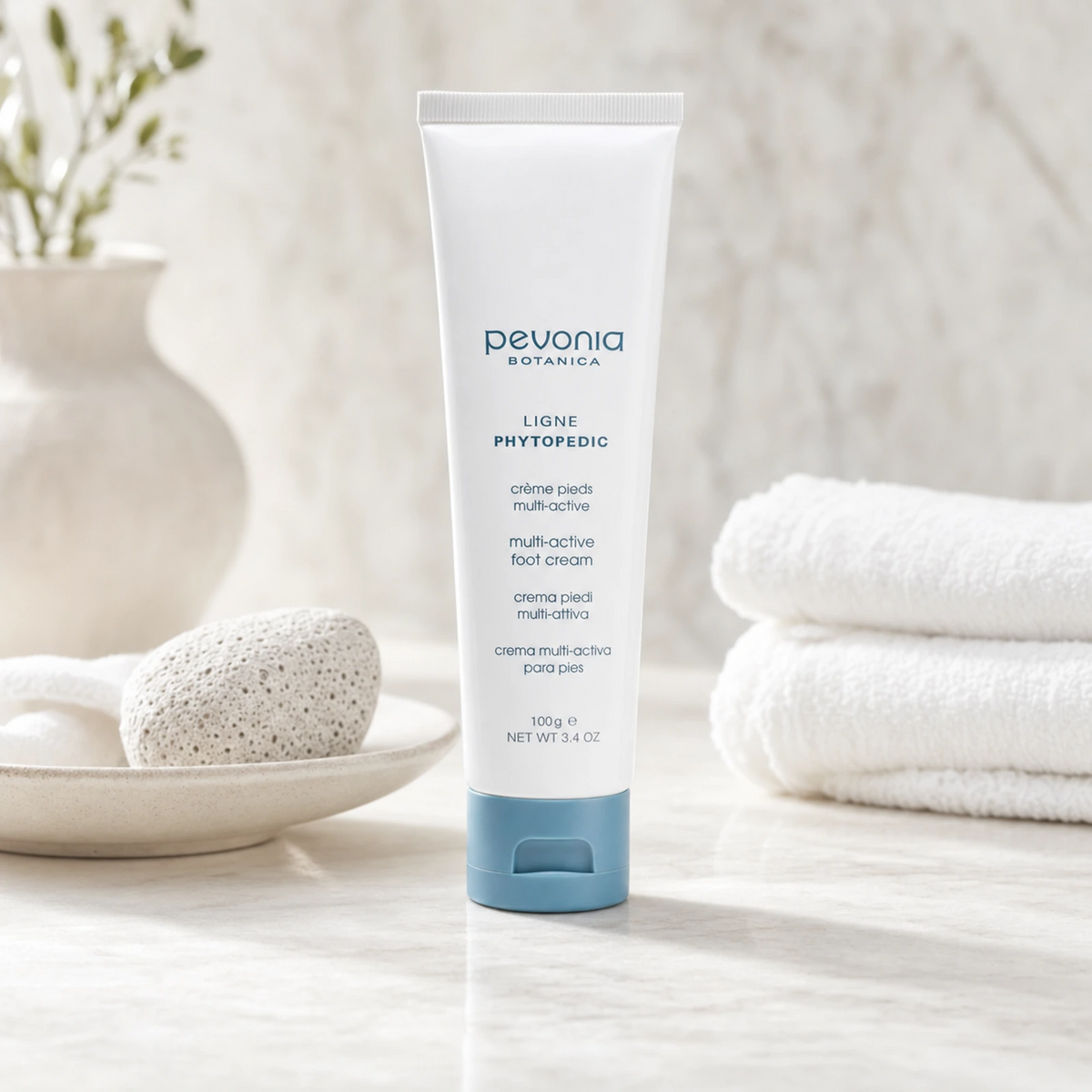 Pevonia Multi-Active Foot Cream 100ml on a luxury bathroom vanity for dry, rough and tired feet