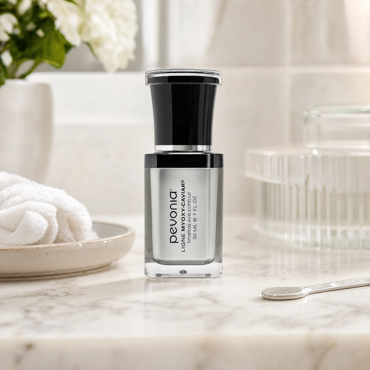 Pevonia MyOxy-Caviar Timeless Eye Contour 30ml on a luxury bathroom vanity for fine lines, puffiness and dark circles