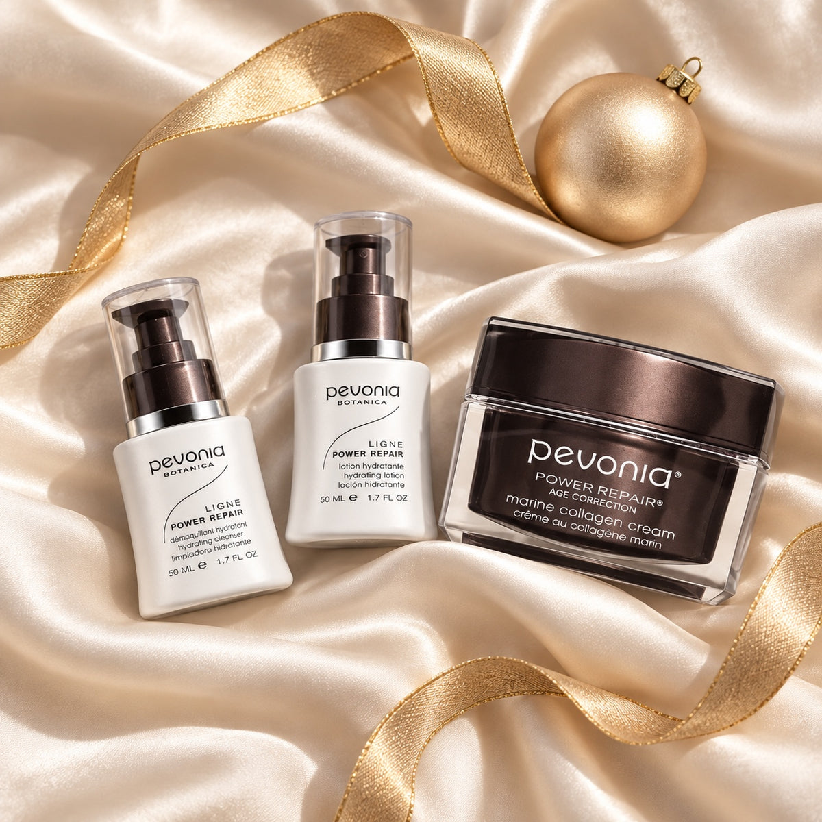 PEVONIA Power Repair Collagen Gift Box arranged in a festive flatlay. File: pevonia-power-repair-collagen-gift-box-christmas-flatlay-2026.jpg