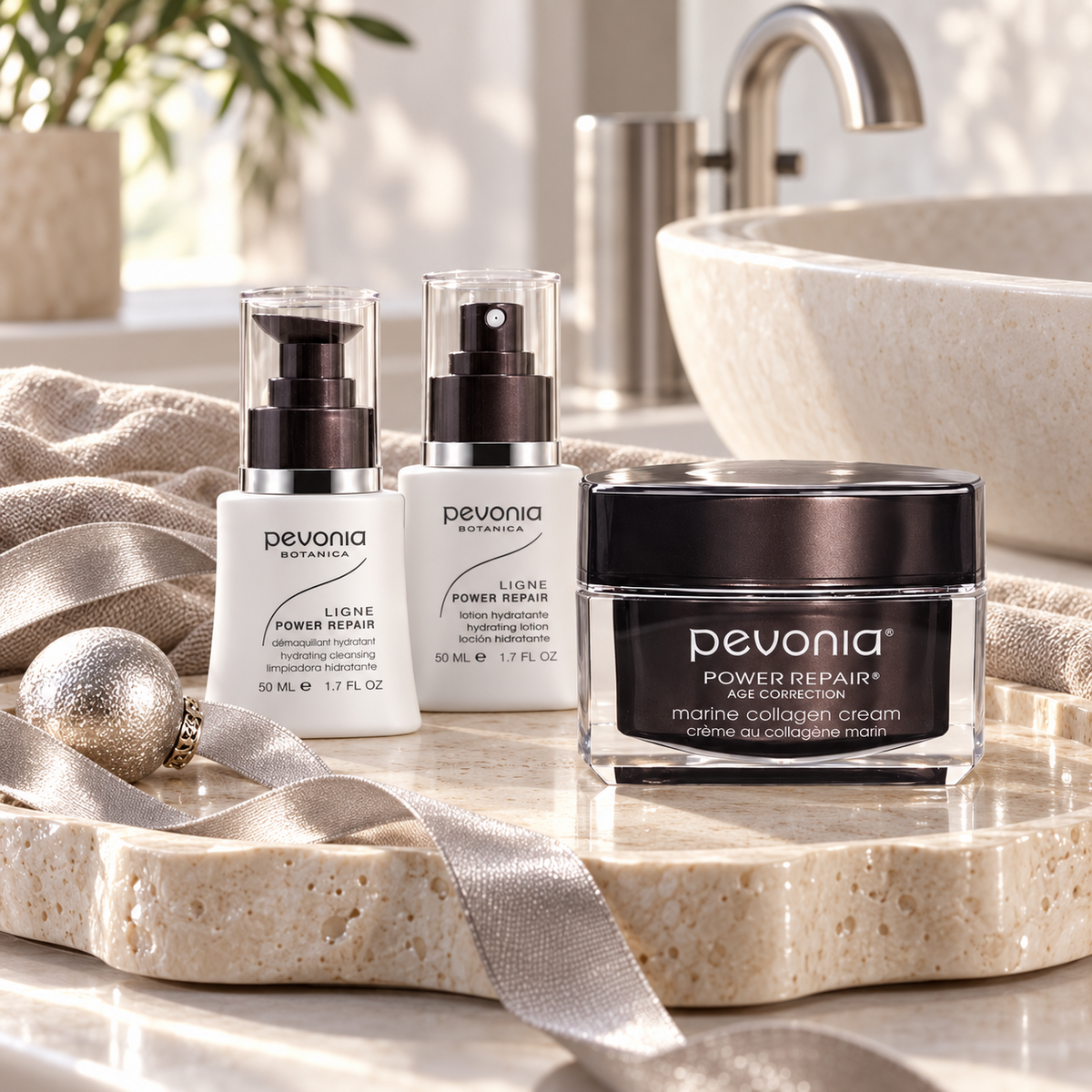 PEVONIA Power Repair Collagen Gift Box in a styled product arrangement. File: pevonia-power-repair-collagen-gift-box-products-creative-2026.png