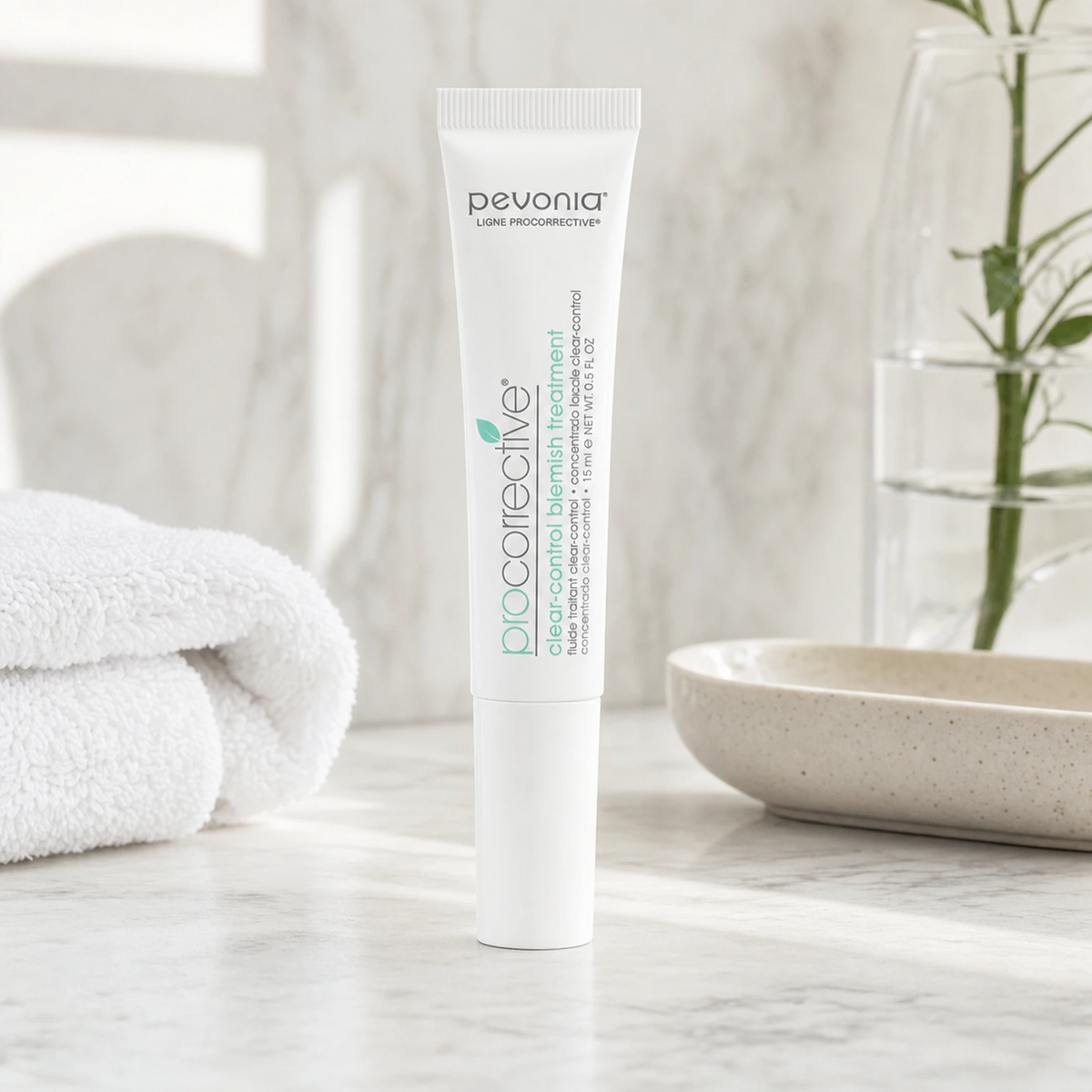Pevonia ProCorrective Clear-Control Blemish Treatment 15ml on a luxury bathroom vanity for active breakouts, blemishes and congested skin