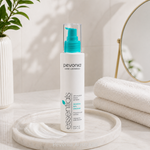 Pevonia Sensitive Skin Cleanser 200ml cream cleanser on marble tray with texture swatch towel and mirror in soft bathroom setting for gentle cleansing and sensitive skin comfort